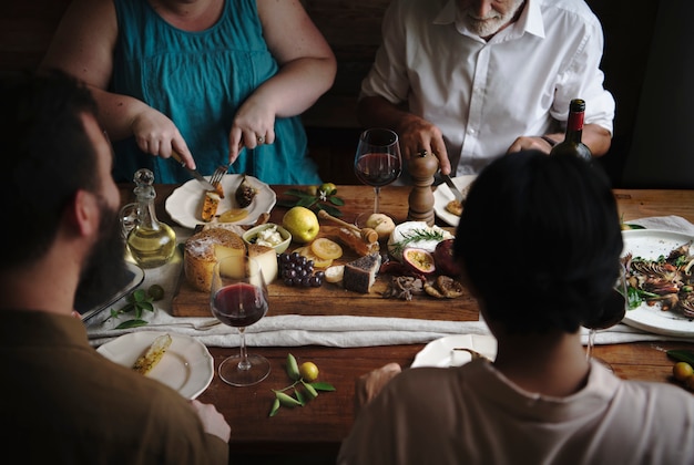 Free Photo people enjoying a cheese platter food photography recipe idea