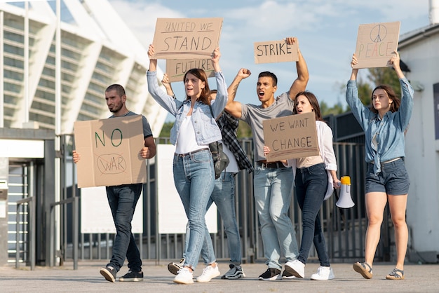 Free photo people protesting together for peace