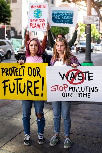 Free Photo people at a world environment day protest outdoors with placards