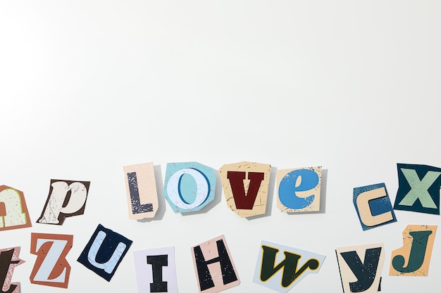 Free Photo phrase love laid out in letters on a white background