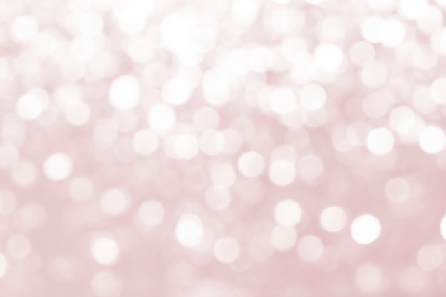 Free photo pink defocused glittery background design