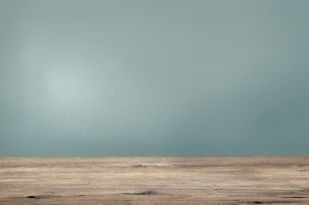 Plain teal wall with wooden floor product background