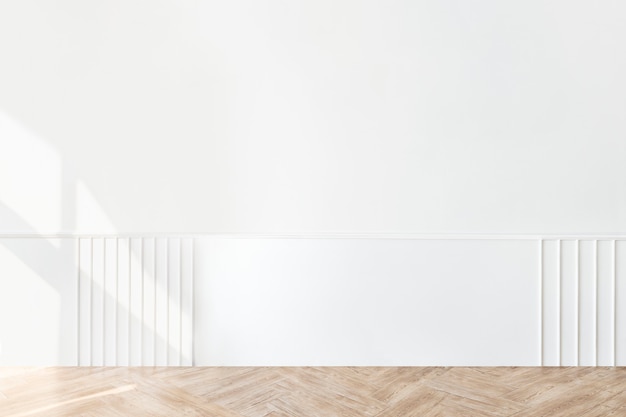 Free Photo plain white wall with a parquet floor