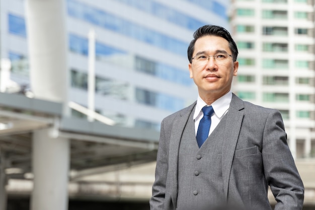 Free photo portrait asian business man business district , lifestyle business people concept