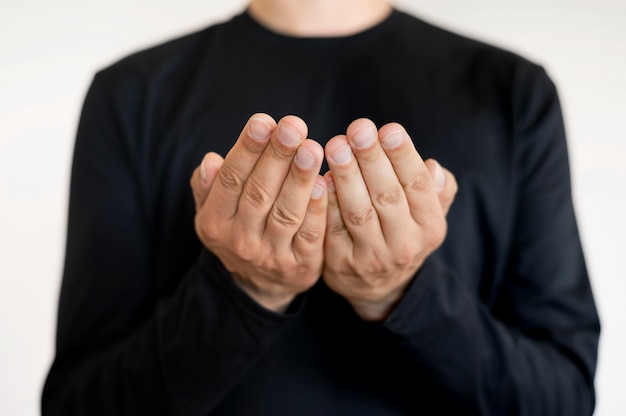 Free photo portrait of interpreter teaching sign language