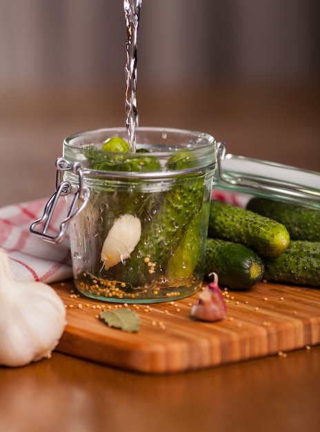 Free Photo preparation of pickled cucumbers with garlic