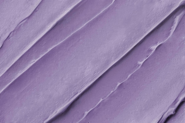 Free photo purple frosting texture background close-up