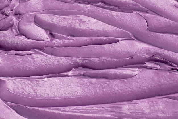 Free photo purple frosting texture background close-up