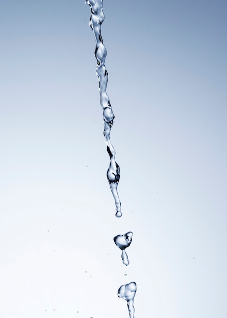 Free photo realistic water drops on light background