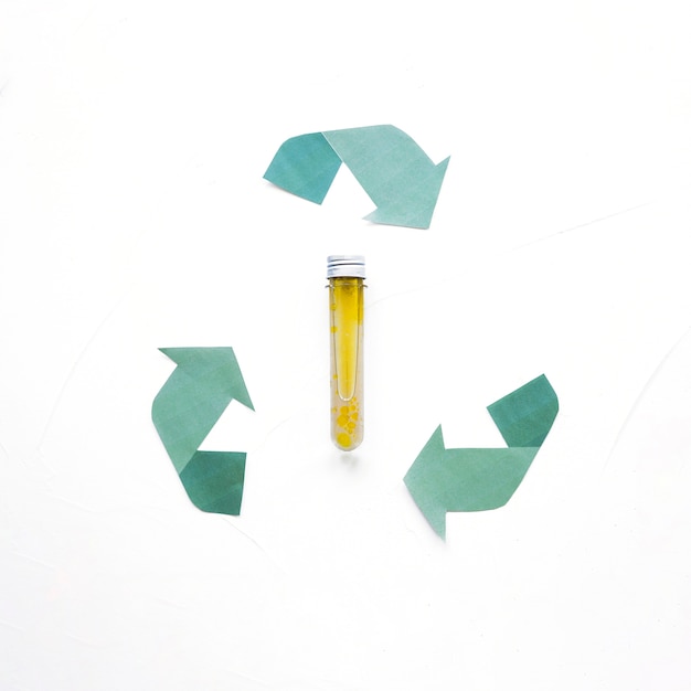 Free photo recycle logo with oil capsule