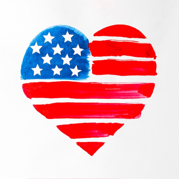 Free photo red and blue heart shape painted usa flag isolated on white backdrop