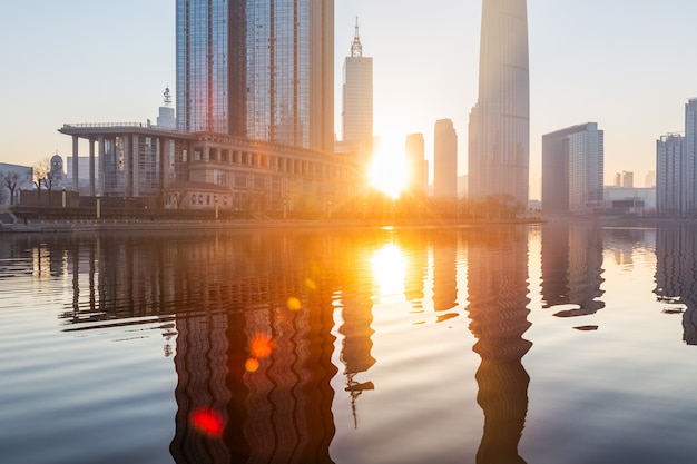 River And Modern Buildings Against Sky