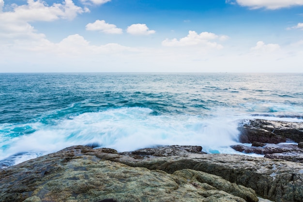 Rock and sea with blue sky