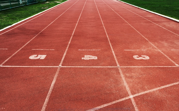 Free photo running tracks at a stadium