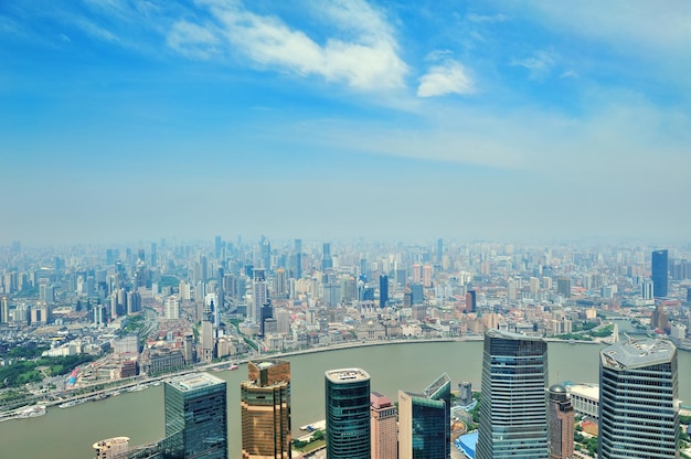 Free Photo shanghai city aerial view in the day with blue sky and cloud