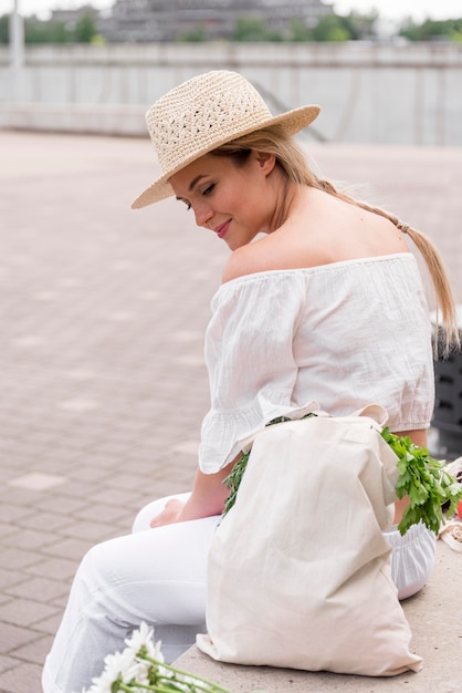 Side view woman wearing white