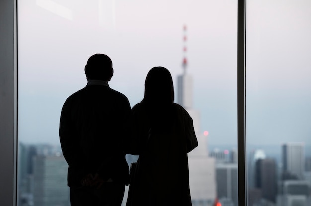 Silhouette of people in the city