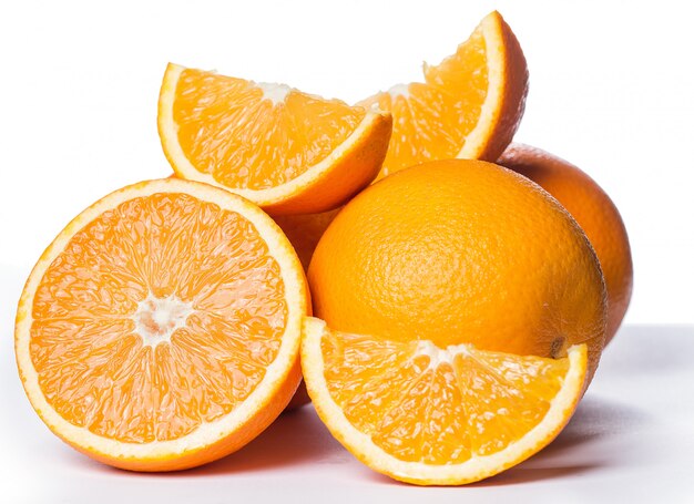 Sliced and whole oranges