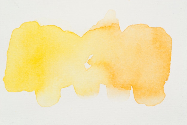 Free photo smears of bright yellow watercolor