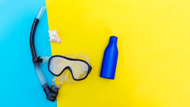 Free photo snorkel mask and bottle