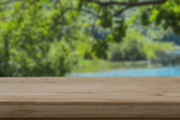 Free photo soft focus of a wooden tabletop in the forest