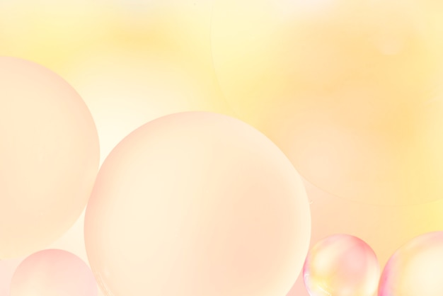 Free Photo soft yellow abstract background with bubbles