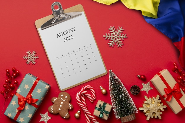 Free photo still life of christmas calendar with colombian flag