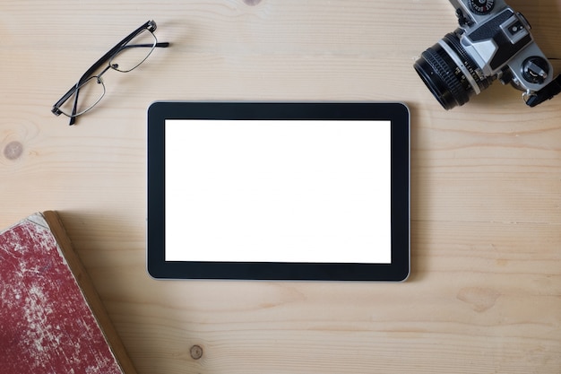 Free Photo tablet screen with camera eyeglasses and book