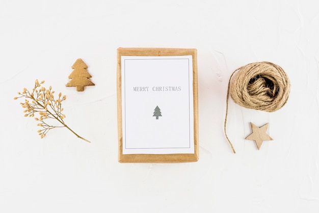 Free Photo tablet with paper between decorative fir tree, star and threads 