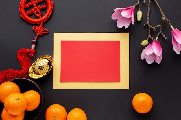 Free photo tangerines and chinese new year card mock-up