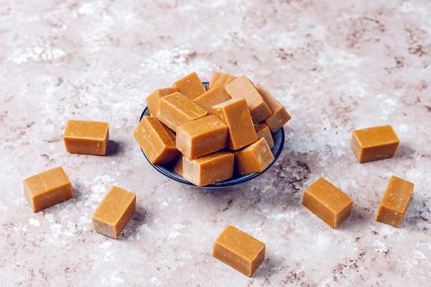 Free photo tasty salty caramel fudge candies with sea salt