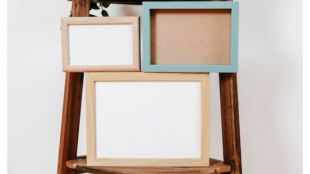 Free photo three frames on shelf