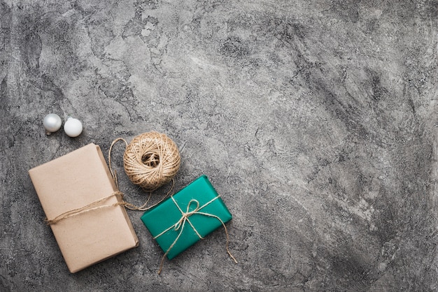 Top view of christmas gifts on marble background