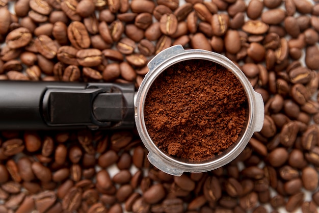 Free photo top view of coffee powder and beans