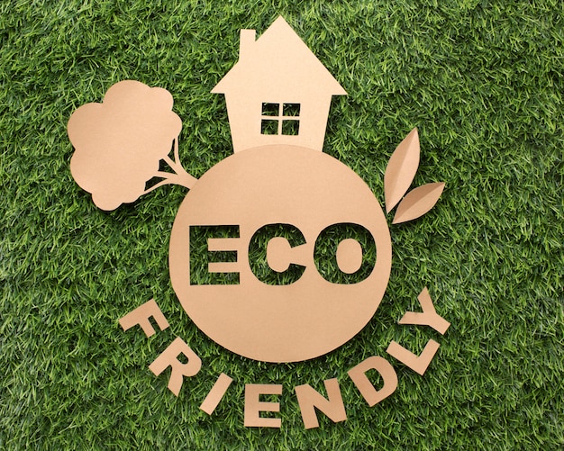 Free Photo top view eco friendly sign on grass