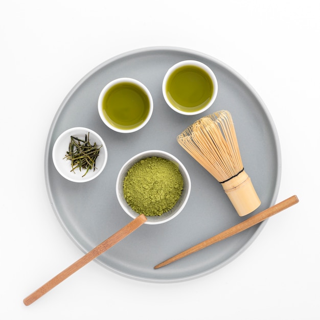 Free photo top view matcha powder with bamboo whisk