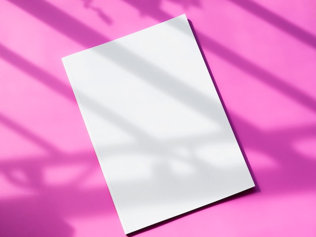 Free Photo top view mock-up magazine with pink background