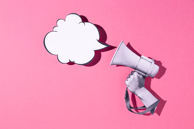 Free Photo top view paper megaphone and speech bubble