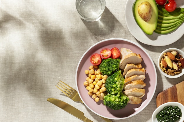 Free Photo top view of plate with keto diet food and nuts