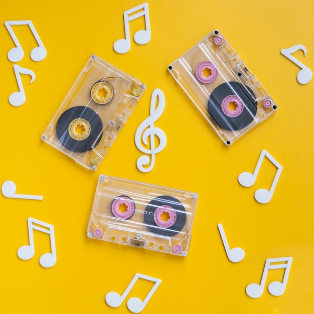 Free photo transparent cassette tapes collection with musical notes around