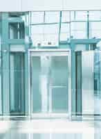 Free photo transparent elevator in underground passage