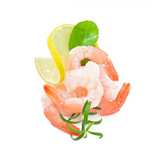 Free photo two tail of shrimp with fresh lemon and rosemary on the white