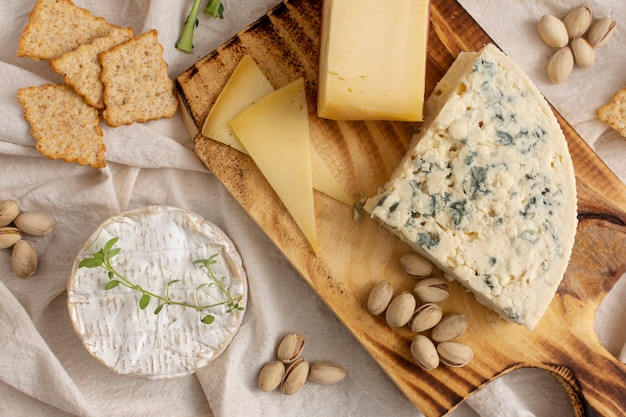 Free photo variety cheeses and snacks on a table