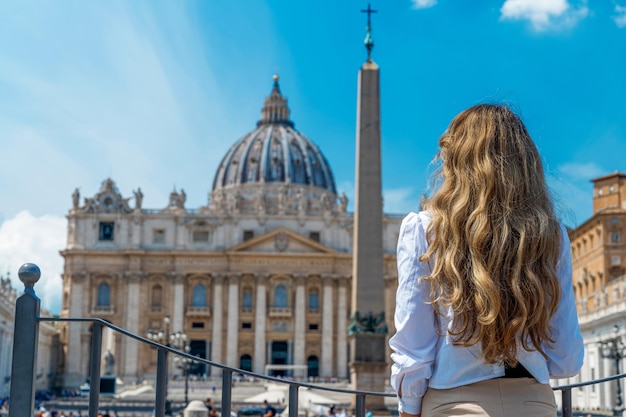 Free Photo view of the woman from behind in vatican city