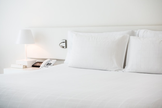 Free Photo white bed with white pillows