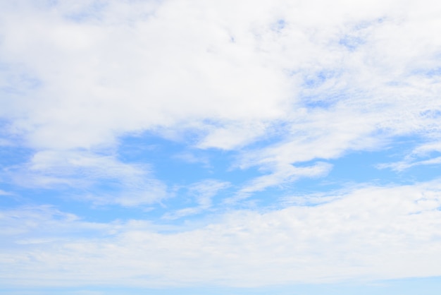 Free photo white clouds with blue sky background