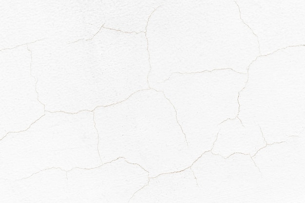 Free photo white cracked wall texture background