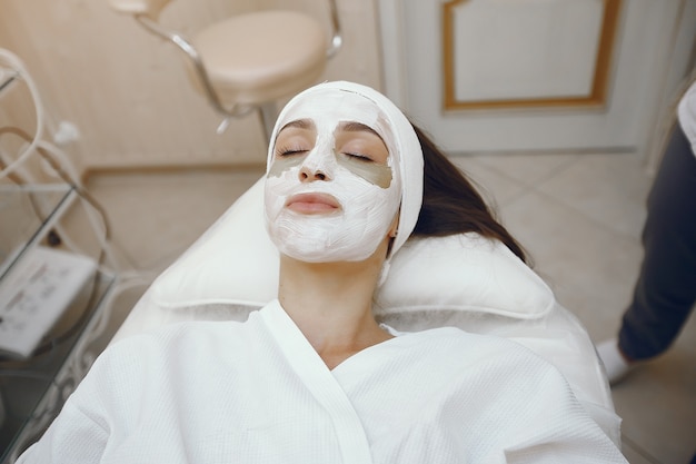 Free Photo woman in cosmetology studio on a procedures