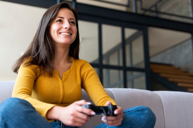 Woman having fun playing video games