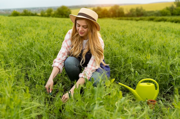 Free photo woman working at farm